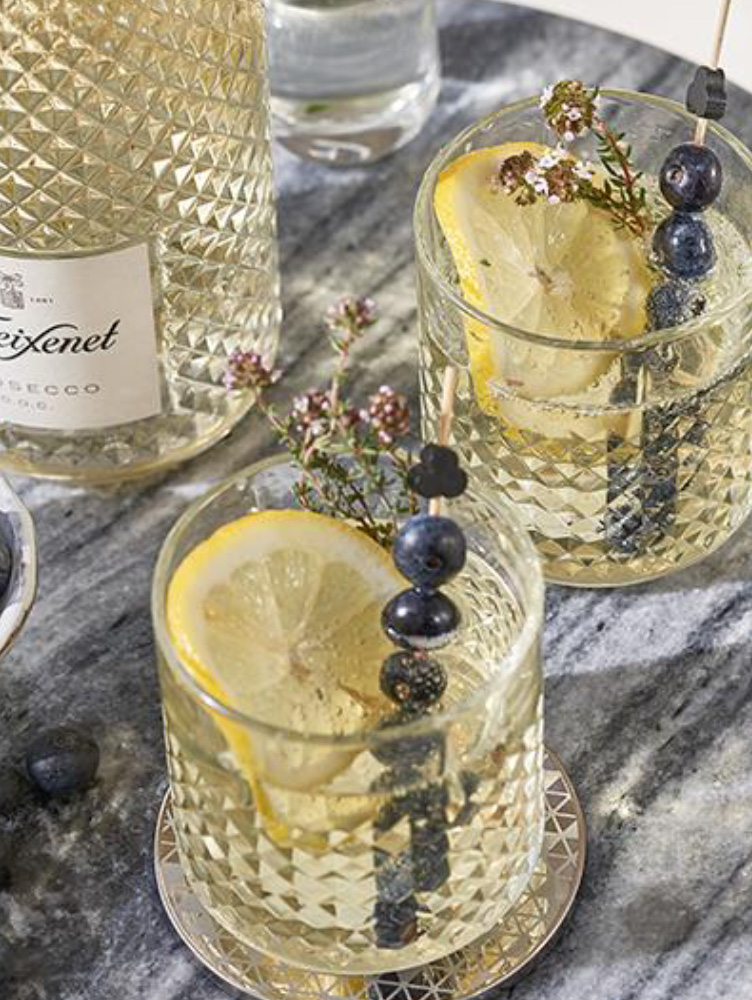 Card image for the blog: Limoncello Prosecco with Thyme and Blueberries category